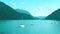 beautiful boats and yachts float on picturesque lake Achensee in Austria, green mountains rises above calm expanse of water,