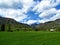 Beautiful Bohinj countryside with a meadow and trees