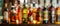 Beautiful bokeh from a row of alcoholic bottles in backlight