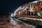 Beautiful Bolsheokhtinsky bridge at night.Iron structure of the arched bridge. Metal beams, spans, bolts and rivets.Side view of B