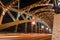 Beautiful Bolsheokhtinsky bridge at night.Iron structure of the arched bridge. Metal beams, spans, bolts and rivets.Side view of B