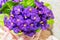 Beautiful bouquet of artificial lilac violets