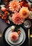 A beautiful bouquet of autumn dahlias on the table. Cozy hygge composition in Scandinavian style