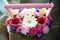 beautiful bouquet of bright wildflowers in basket