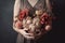 beautiful bouquet of dried flowers in the hands of a girl, Hands holding heart with flowers love, AI Generated