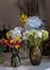 Beautiful bouquet of flowers in Assorted many different glass vases in flower shop