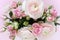 Beautiful bouquet of gently pink roses and ranunculus