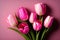 Beautiful Bouquet of pink Yellow And Green tulips flowers on pastel pink background generative ai