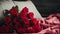 a beautiful bouquet of roses placed on a cozy bed, capturing the essence of Valentine\'s Day celebrations in a