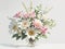 Beautiful bouquet showcases a harmonious blend of white and pink flowers creating a soft and elegant color palette.