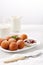 Beautiful breakfast. Cottage cheese donuts  balls  on a light background