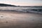 Beautiful breaking waves on sandy beach on atlantic ocean, basque country, france