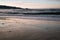 Beautiful breaking waves on sandy beach on atlantic ocean, basque country, france