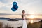 Beautiful bride with balloons