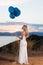 Beautiful bride with balloons