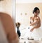 Beautiful bride and bridesmaids posing in room before wedding