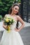 Beautiful bride holding a bouquet