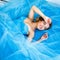 Beautiful bride lying on gorgeous blue dress Cinderella style