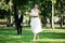 Beautiful bride posing outdoors on wedding day