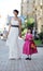 Beautiful bride posing together with flowergirl