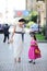 Beautiful bride posing together with flowergirl