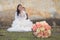 Beautiful bride\'s bouquet behind the blurred bride