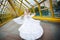 Beautiful bride in a wedding dress on bridge