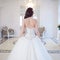 Beautiful bride. Wedding dress with open back. Luxurious light interior