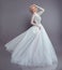 Beautiful bride in wedding flowing chiffon dress, Woman in long