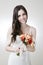 Beautiful bride with wedding orange bouquet