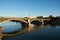 The beautiful bridge of Isabella Cattolica, on the Guadalquivir River in Seville, also known as the Triana Bridge