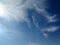 Beautiful bright blue sunny sky with white fluffy cumulonimbus clouds