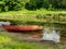 Beautiful and bright boat on the banks of Seda river,