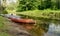 Beautiful and bright boat on the banks of Seda river,