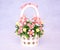 Beautiful bright bouquet of flowers in a basket made of ceramic