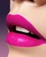 Beautiful bright Fashion Make-up on full Lips. Trend pink lip Makeup. Vivid shiny Lipgloss