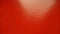 Beautiful bright red background. Closeup sheet of shiny reflecting incident light paper. Pure fun color. Intense shade of red,