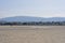 Beautiful bright view on South Dublin and the Mountains seen from Sandymount Beach, Dublin, Ireland during lowest tide