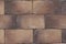 Beautiful brown brown stones bricks, background texture. Structured stone textured basement and stairs