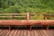 Beautiful brown wooden seat in green mangrove forest