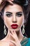 Beautiful brunette girl with arabic evening make-up and perfect skin. Beauty face. Close up