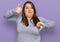 Beautiful brunette plus size woman wearing casual clothes doing thumbs up and down, disagreement and agreement expression