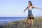 Beautiful brunette posing on the beach