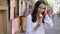 Beautiful brunette woman eating delicious and sweet ice cream