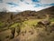 Beautiful bucolic view of a house of muddy in the midlle of the mountains with cactus in Colca Canyon, Peru