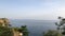 Beautiful buildings, green rocks and Mediterranean sea view in Antalya, Turkey. 4k video