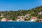 Beautiful builings and mansions at the costline and hillslope with green forest in summer, at Bosphorus Strait in Istanbul,Turkey