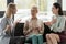 beautiful businesswomen gesturing while talking