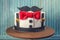 Beautiful cake for men, decorated in the form of a suit with a bow tie. Concept of the desserts for the birthday boy