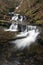 Beautiful calm landscape image of Scaleber Force waterfall in Yorkshire Dales in England during Winter morning